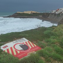 Coast of the little village Consolação with an interesting traffic sign